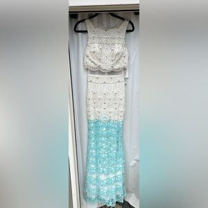 Adorable Tony Bowls white and teal beaded prom dress